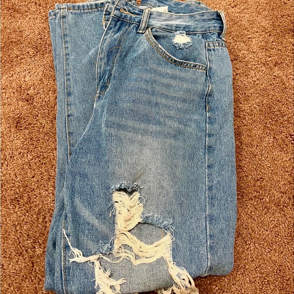 brand new ripped jeans